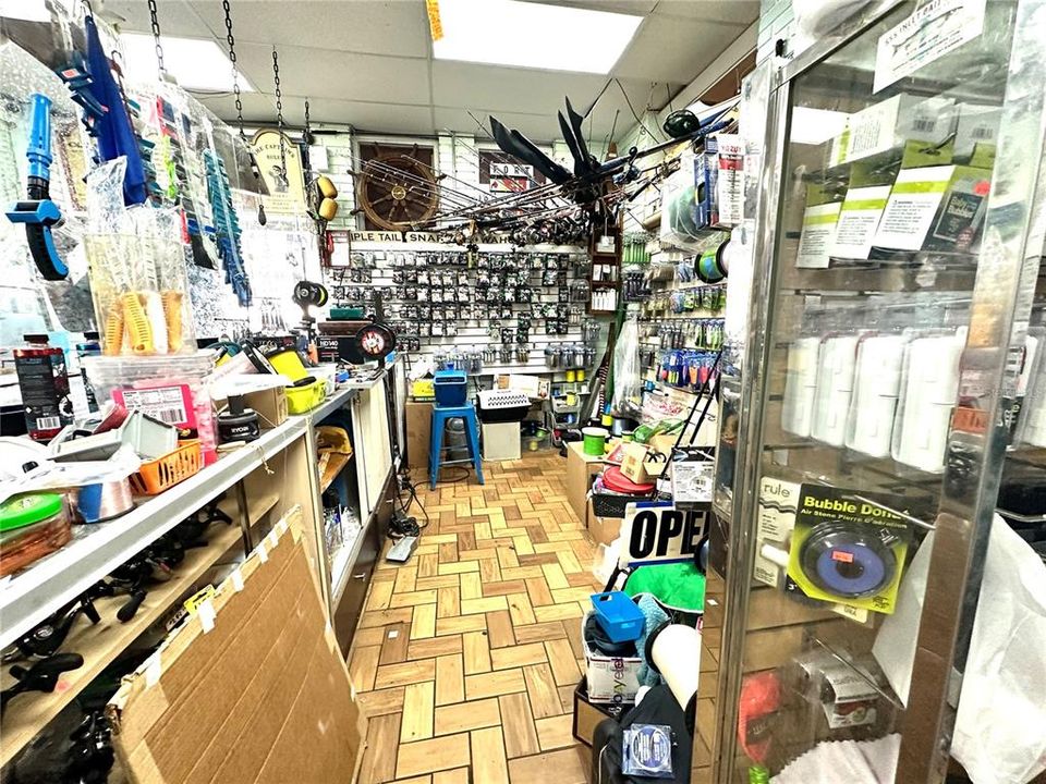 Behind the front counter- All merchandise, tanks, and equipment shown in the photos are included