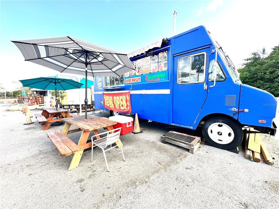 Food truck and benches are included