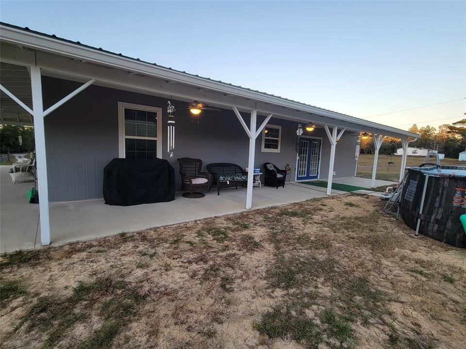 Back covered porch with fans and lights