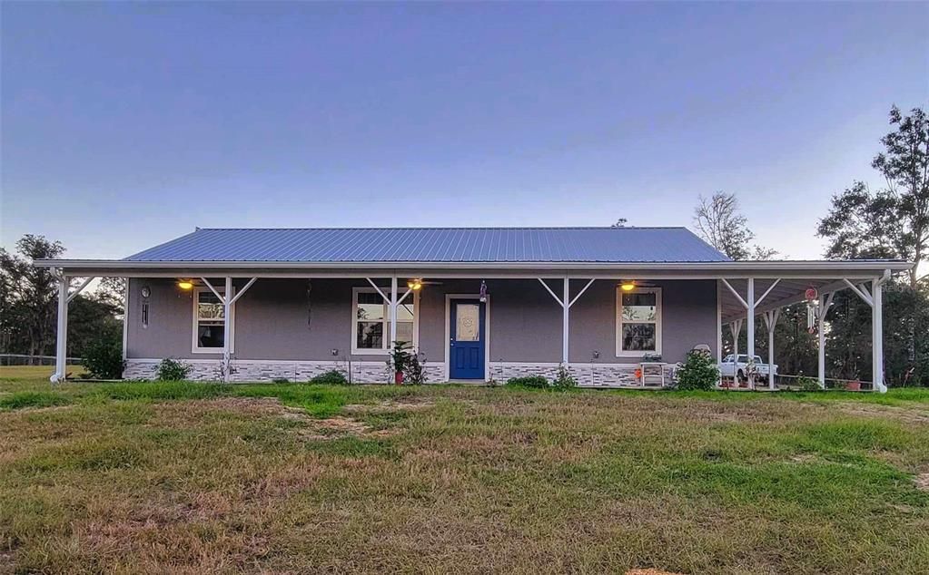 Home with wrap around porch