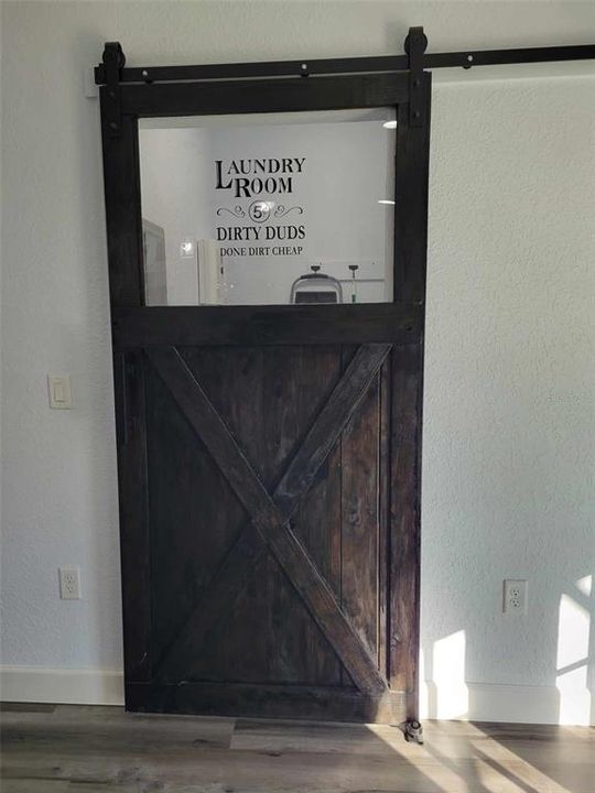 Custom laundry barn door