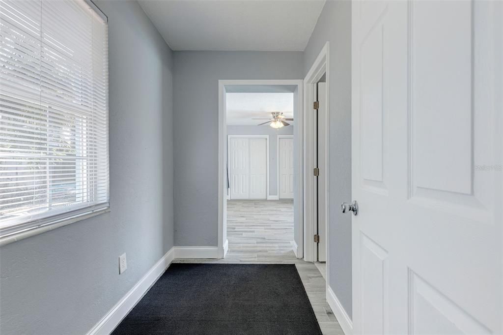 Hallway leading into the Primary Bedroom