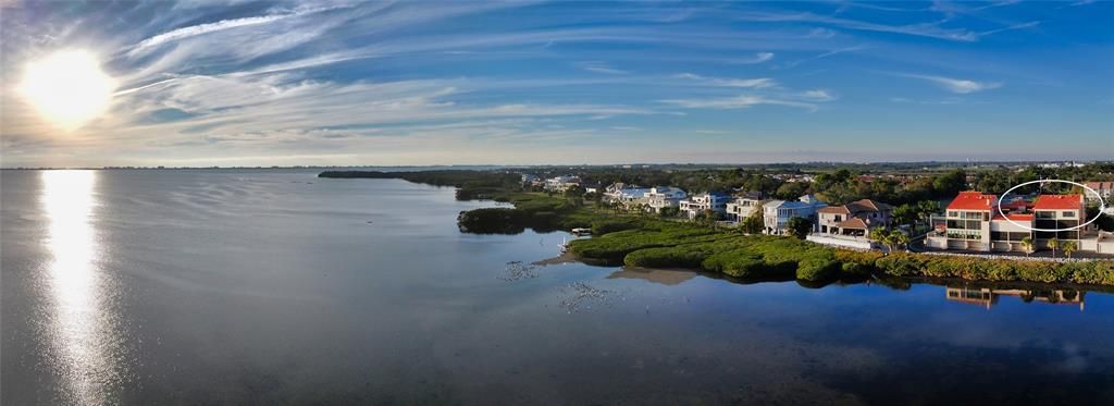 Nestled directly on the bay