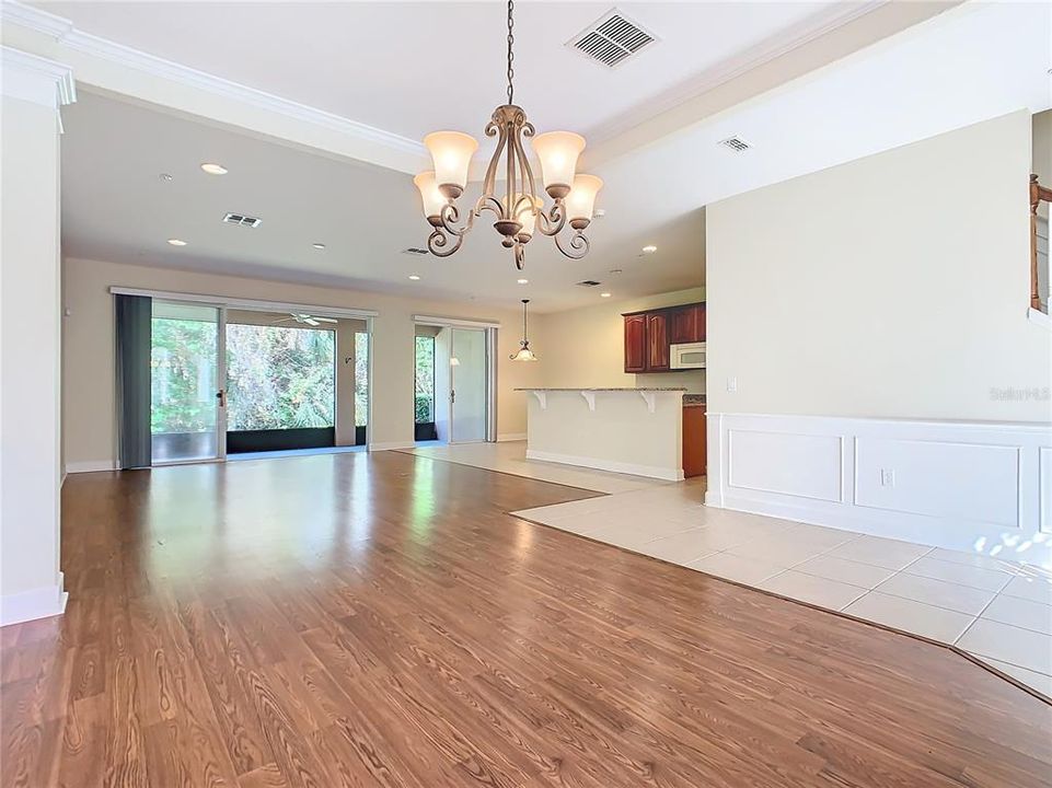 So much character in the home with tray ceiling and wainscoting at the staircase, entryway, and dining room.