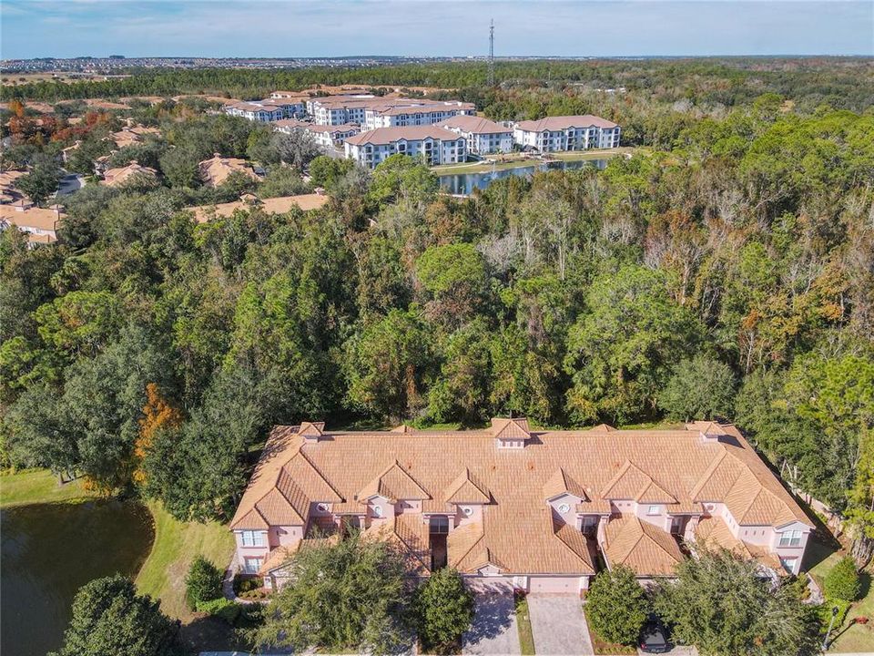 This view shows the property which is the third unit from the left.