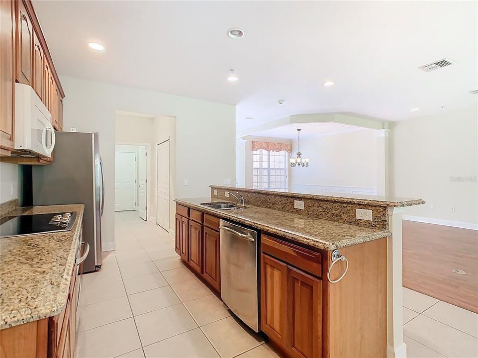 Looking from the kitchen to the garage door.