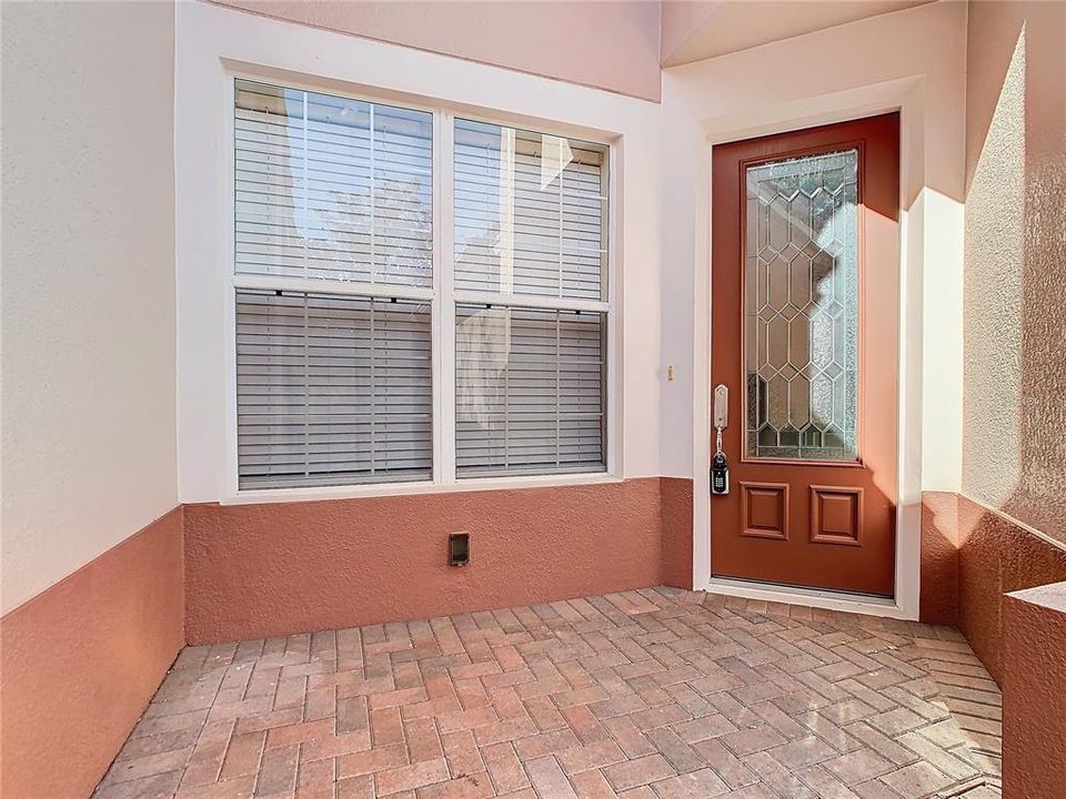 Upon entering through the front door, you'll notice all of the natural light coming through the front door, windows, and sliding glass doors leading to the lanai.