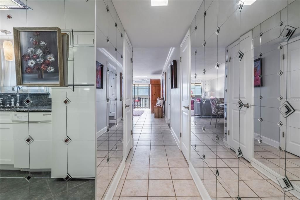 ENTRY WALL AND INTO KITCHEN CUSTOM MIRRORED