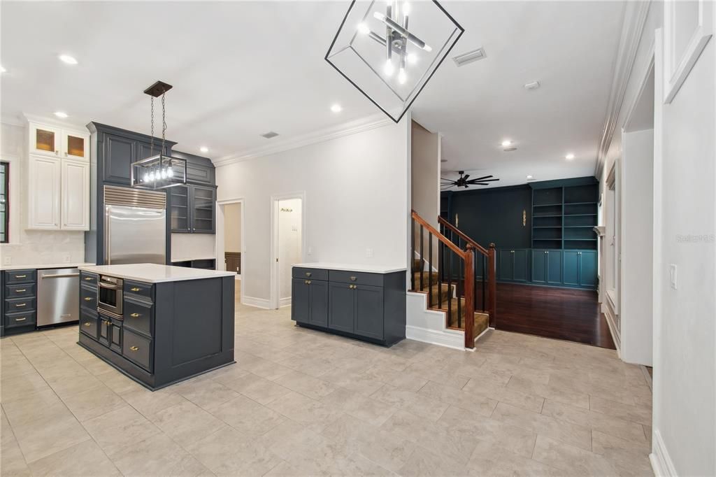 Kitchen/towards upstairs