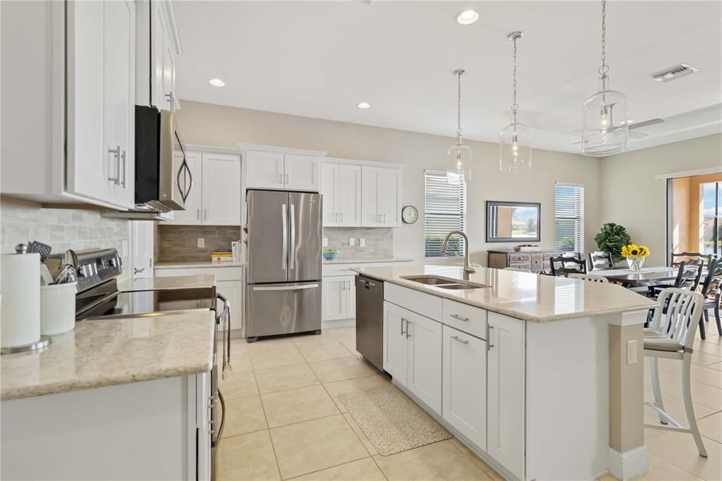 This kitchen has large counters for those who love to cook and entertain