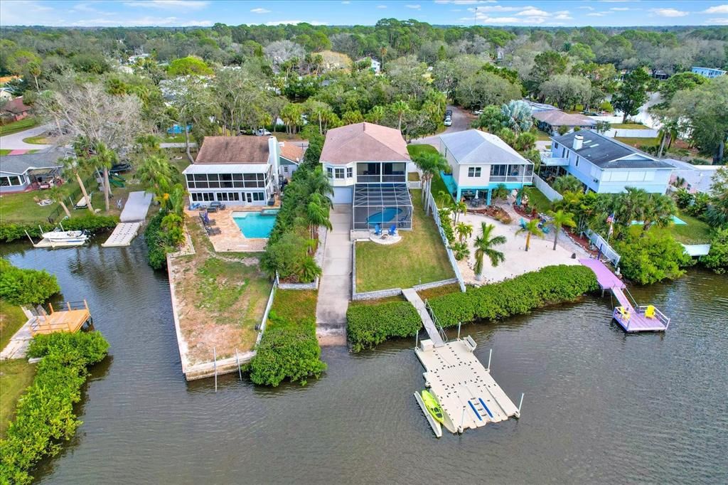 Pool, dock, private boat launch from tandem pull through garage, balconies and sunsets!