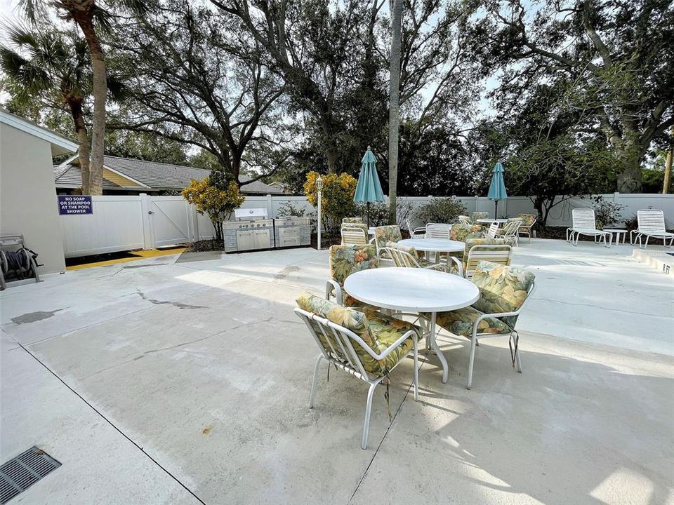 There are tables and chairs and a grill for your use on the pool deck.