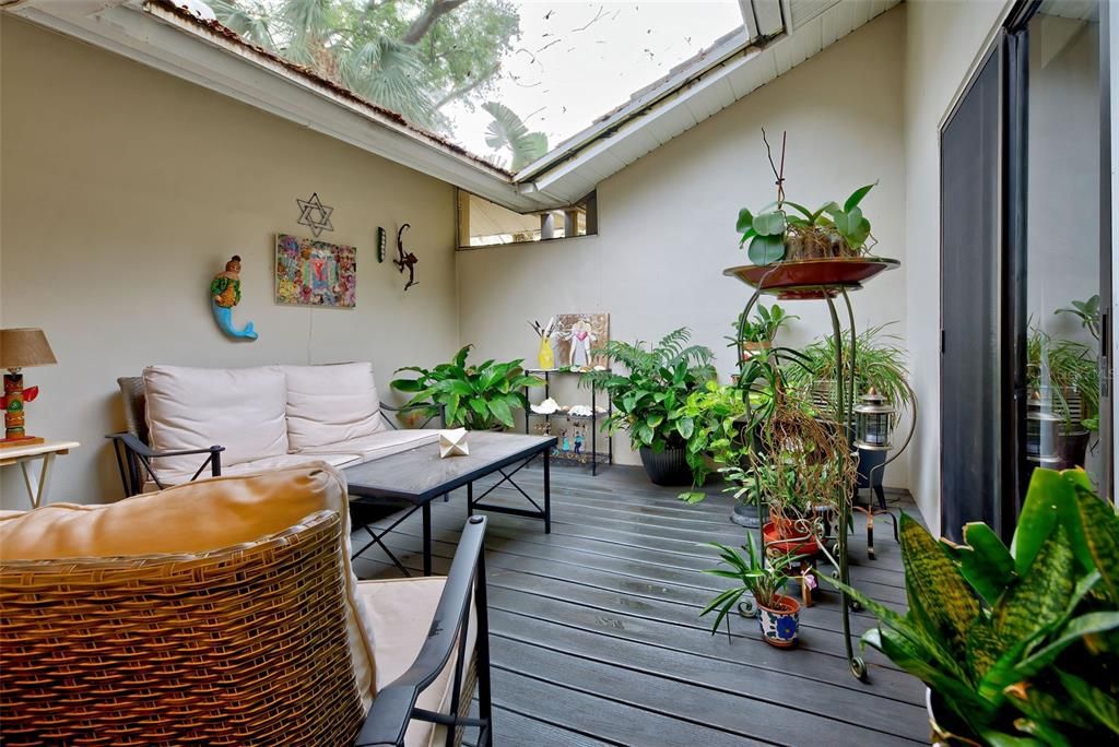 The deck is a very inviting space and a wonderful place to grow plants.