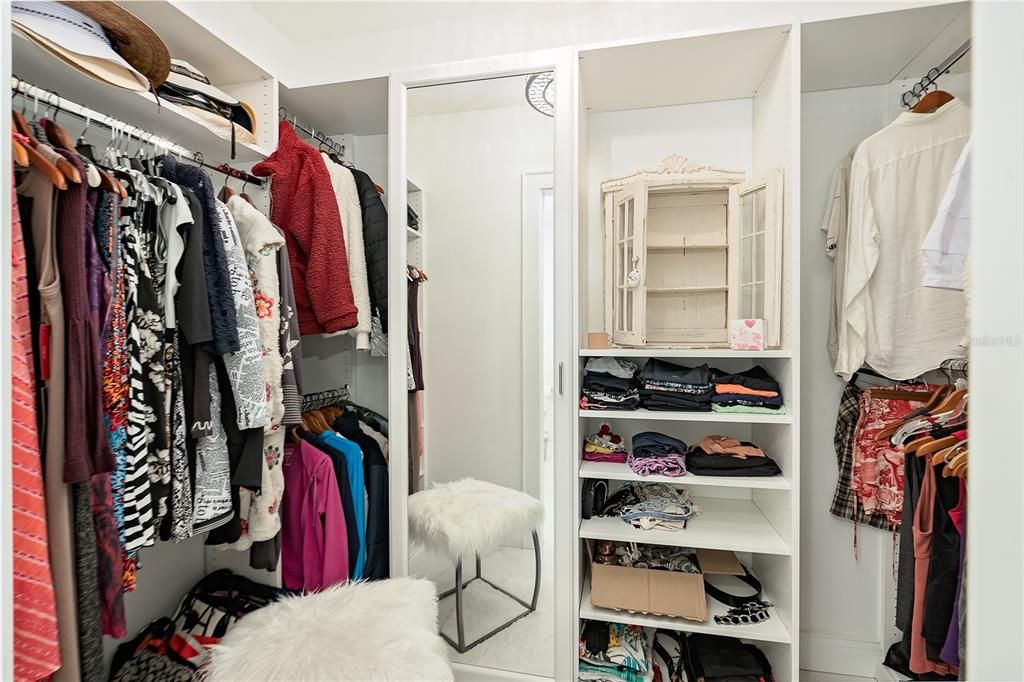 Spacious primary closet with organization system  from Closets by Design