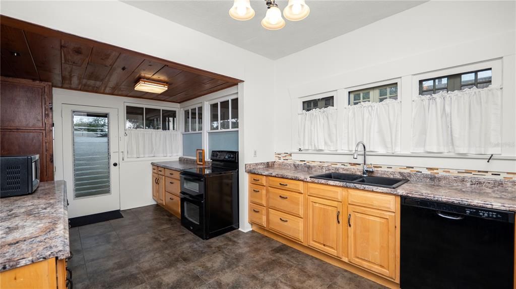 Lots of windows giving natural light, and a double oven/convection oven