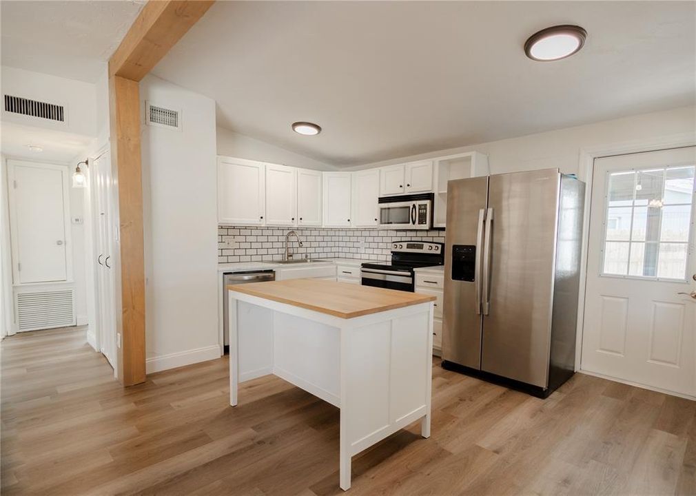 Kitchen with large cooking island