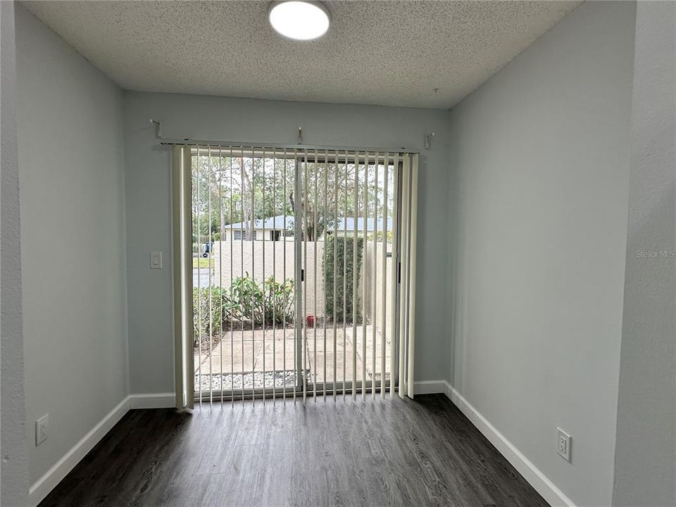 Breakfast room onto walled patio