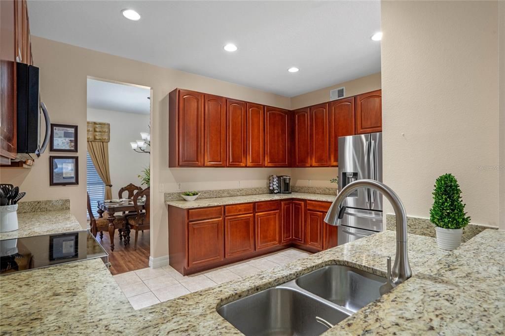 Gorgeous kitchen with stainless steel appliances & granite