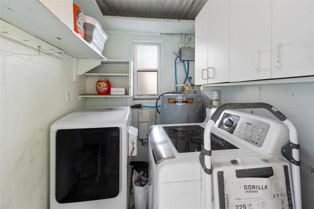 outdoor laundry/storage room