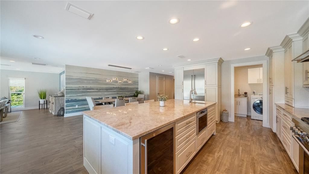 Gathering is made easy here with this open concept floor plan featuring this spectacular kitchen and eat in dining area.