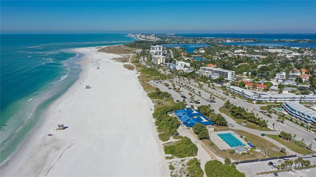 Enjoy morning walks to the sandy shores of Lido Beach just steps from your front door.