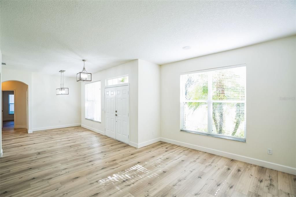 Front Door, Foyer, Living Room and Dining Room