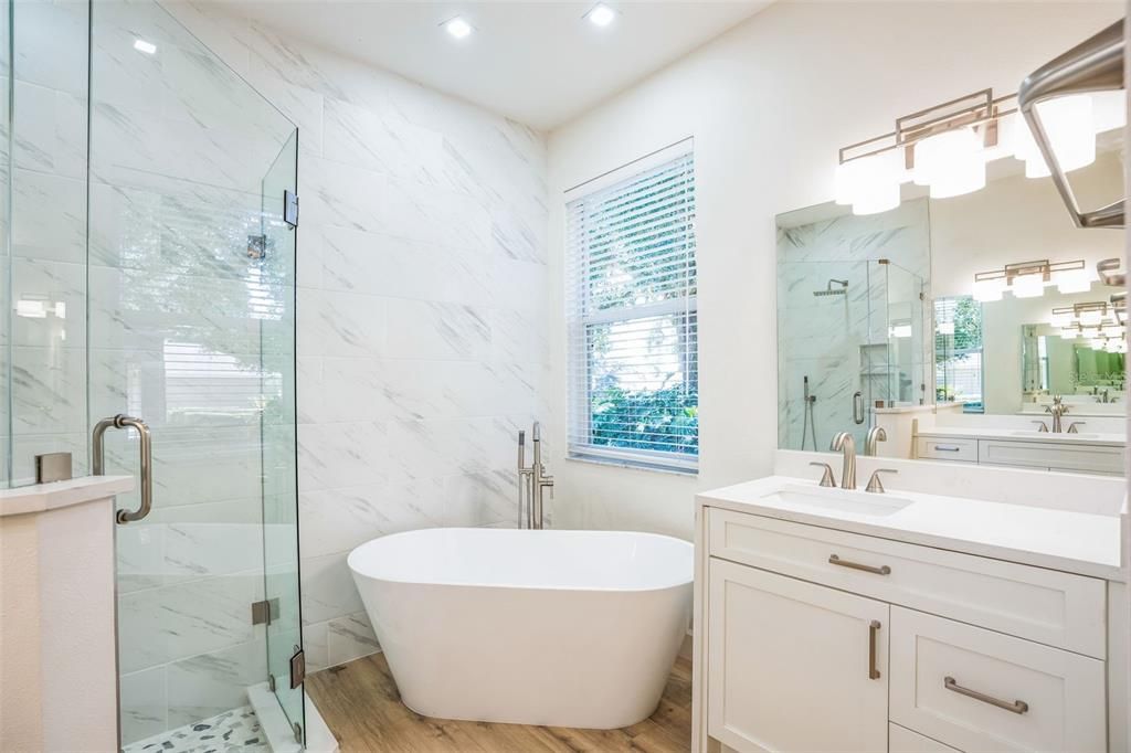 Master Bath with soaking tub and frameless glass shower doors