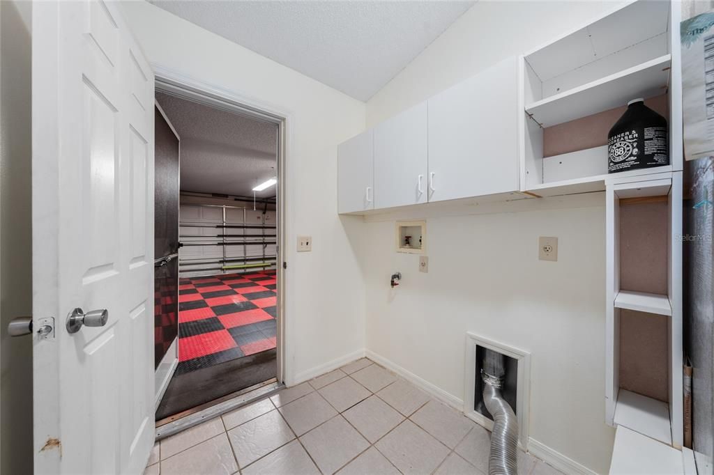 Inside Laundry with cabinets - ready for your washer & dryer!