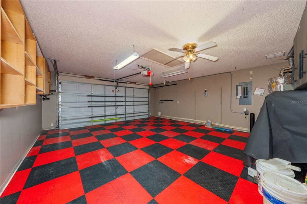 Garage floor tiles and storage shelves