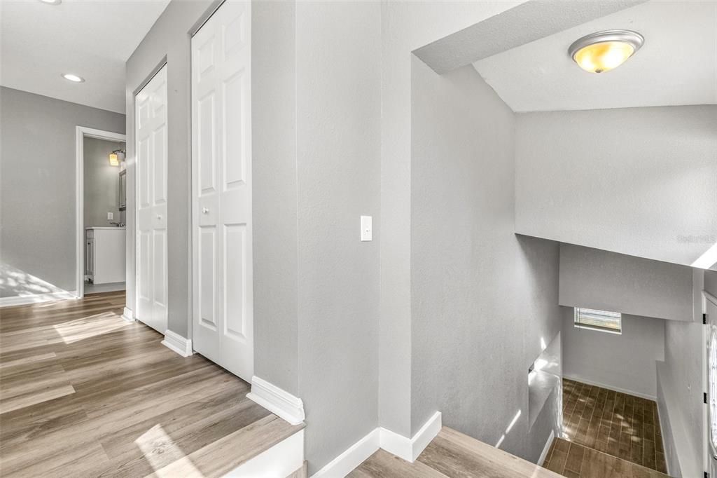 Additional closets at the top of the stairs for added storage. Wood-look vinyl flooring throughout the 2nd floor.