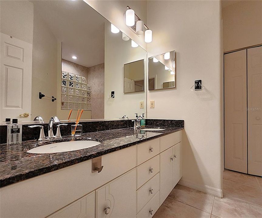 Master includes dual sinks, walkn in shower & private water closet