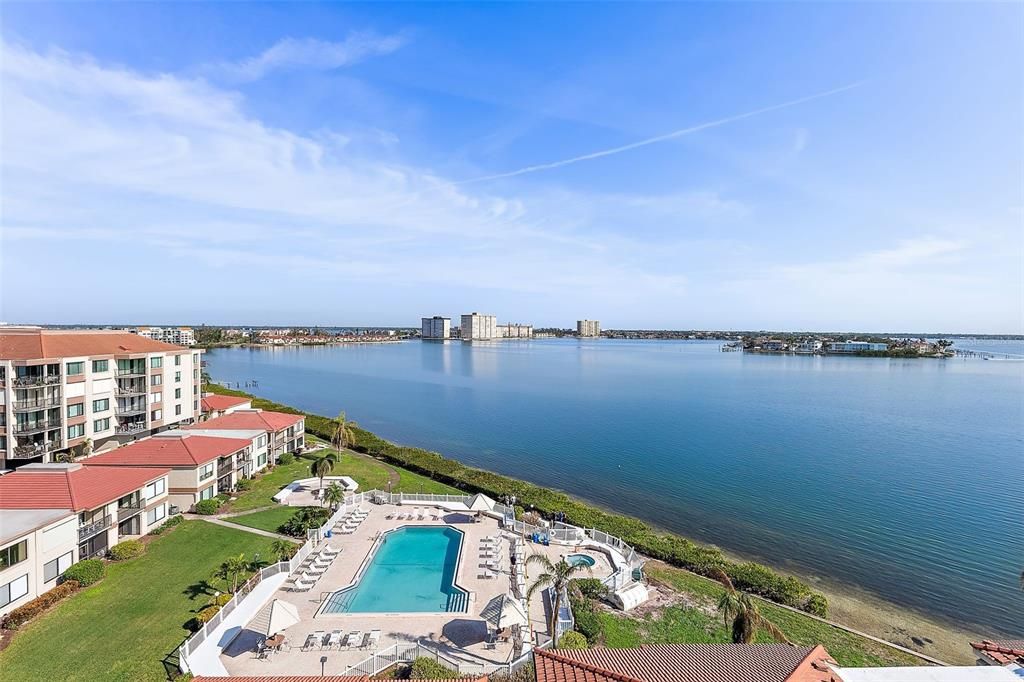 Balcony view overlooking the bay and pool