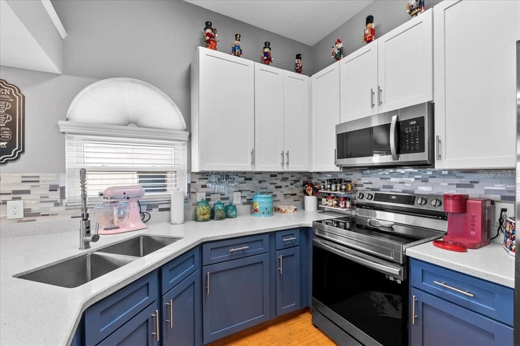 Love that backsplash and updated modern look, with great appliances, modern sink, sprayer faucet, updated counters and cabinets. With this fabulous kitchen, many culinary delights can be created!