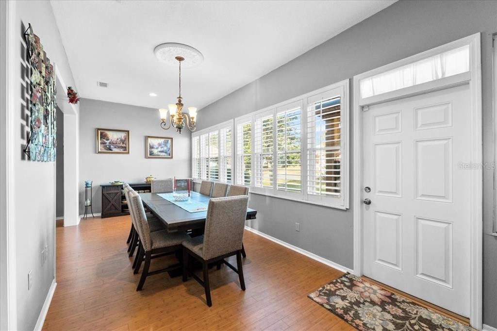 This dining room will accommodate ALL your guests at your next dinner party or game night, and it opens out onto the brick-pavered pergola and lovely back yard with mature fruit trees and landscaping. Fresh grown loquat anyone?