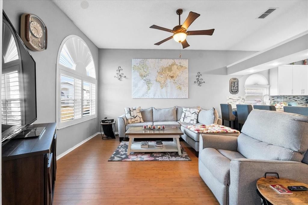 Ahhh, the Living Room! Relax in style in this open space with luxury solid bamboo flooring and a bright arched window. Chat to the chef in the kitchen with ease from your comfy spot and great backyard view.