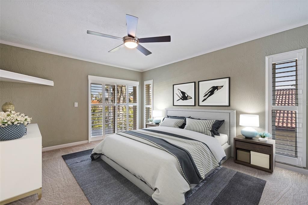 Light-filled primary bedroom. This photo has been virtually staged.