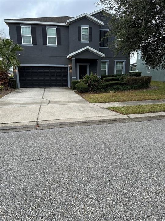 Front of the home with sidewalks