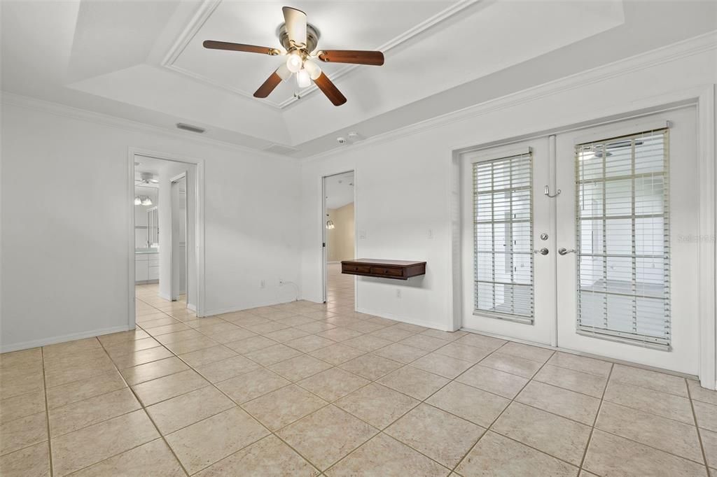 Primary bedroom with French Doors to lanai