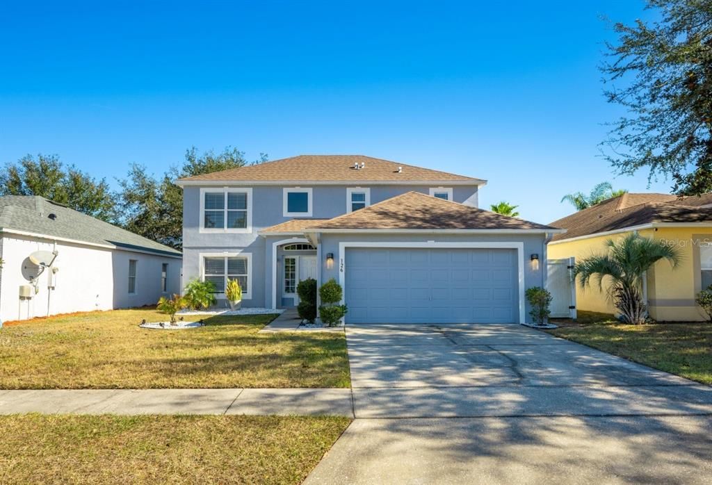 Welcome to Davenport’s Pines West community, in a perfect location for easy access to shopping, dining, golf and theme parks, and a 4BD/2.5BA POOL HOME with a NEWER ROOF (2018), an UPDATED A/C (2022), and LUXURY VINYL PLANK WOOD FLOORS throughout!