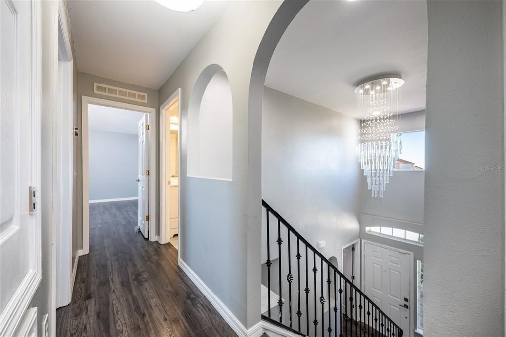 SECOND FLOOR LANDING/TWO STORY FOYER.