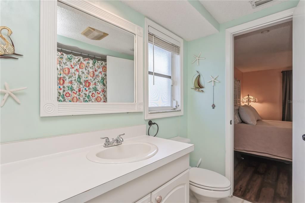 Ensuite bathroom with linen closet