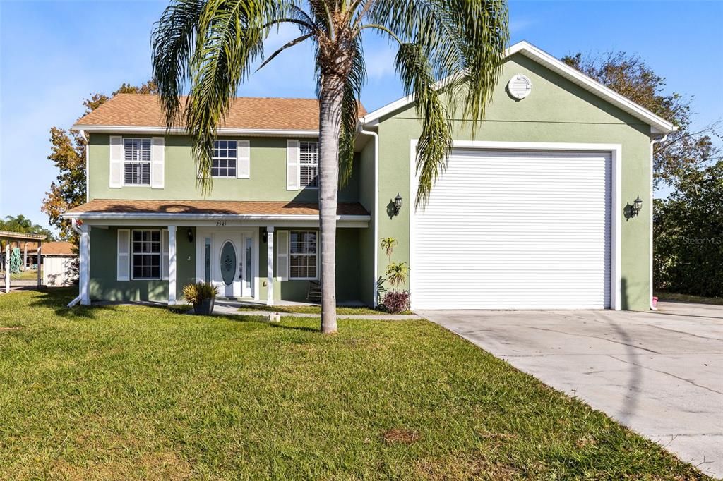 Front of Property and oversized garage