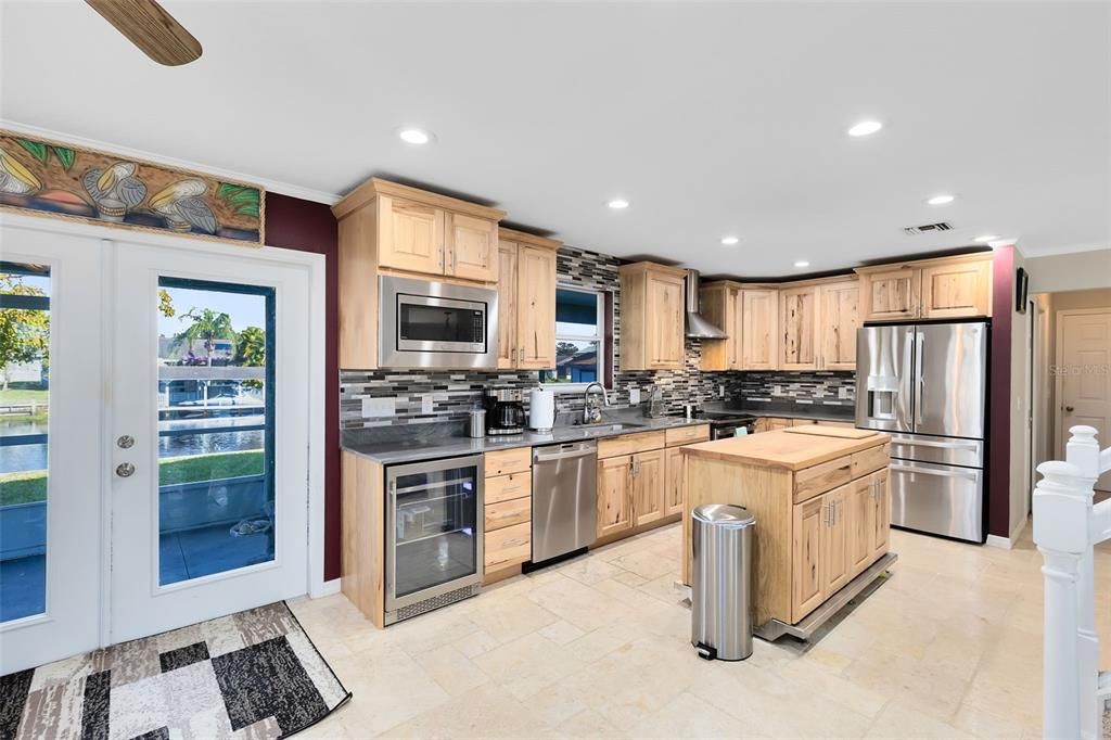 Kitchen and doors to outside and water's view