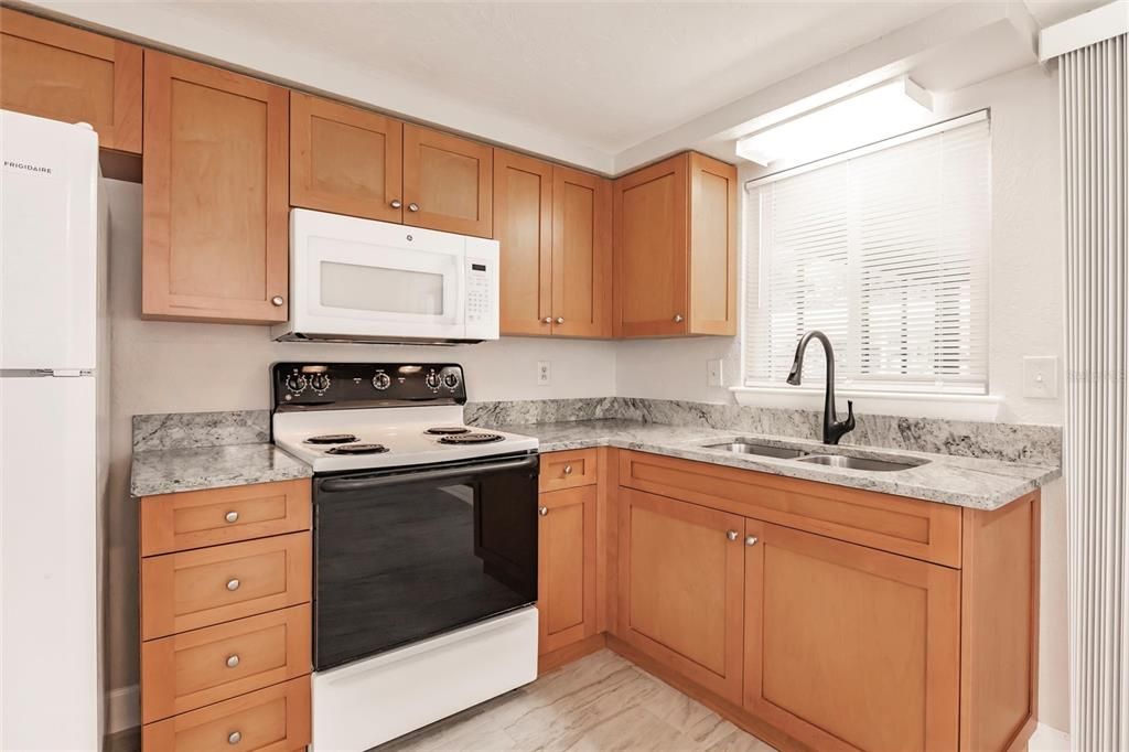 New granite countertop, sink and faucet!