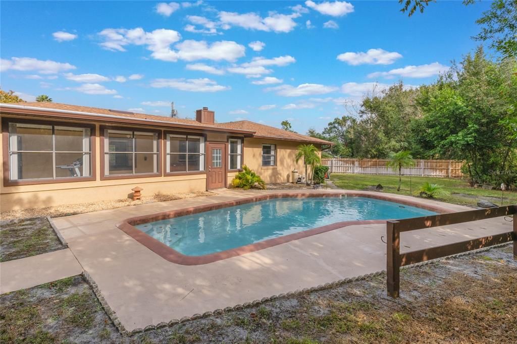 Pool and large fenced side yard