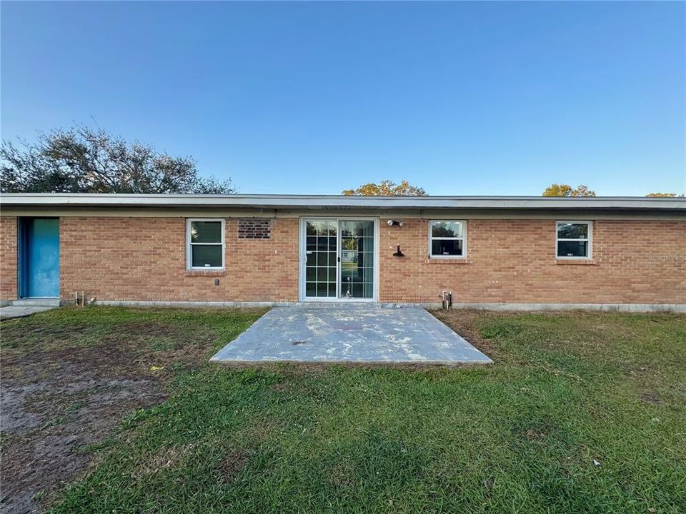 Open patio with concrete slab