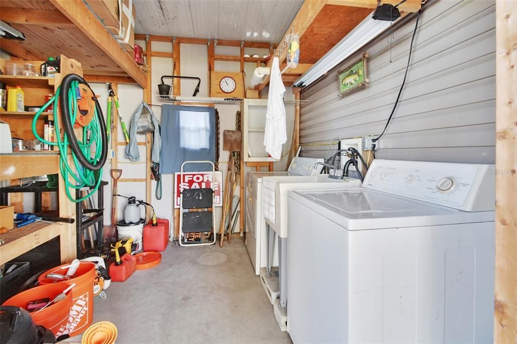 private laundry room with washer and dryer