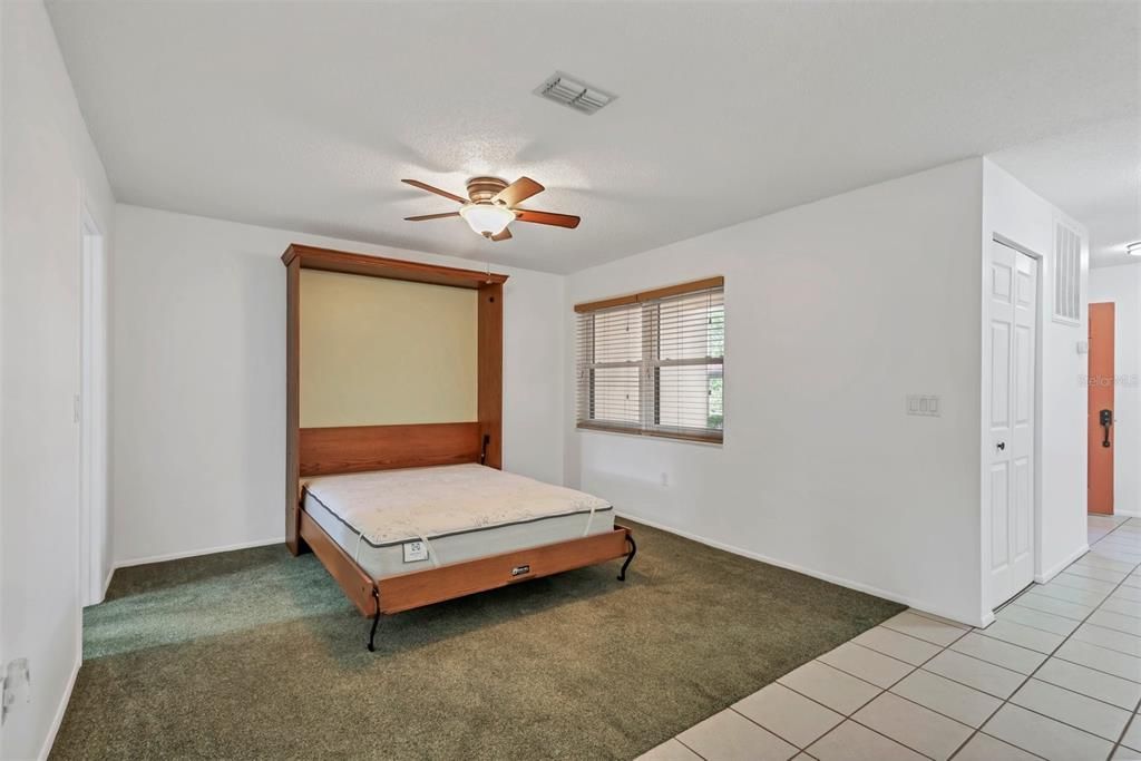 Built in Murphy bed shown open. Good sized bonus room.