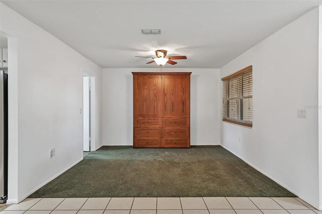 Bonus room with built in Murphy bed can be third bedroom or den. Just add doors!