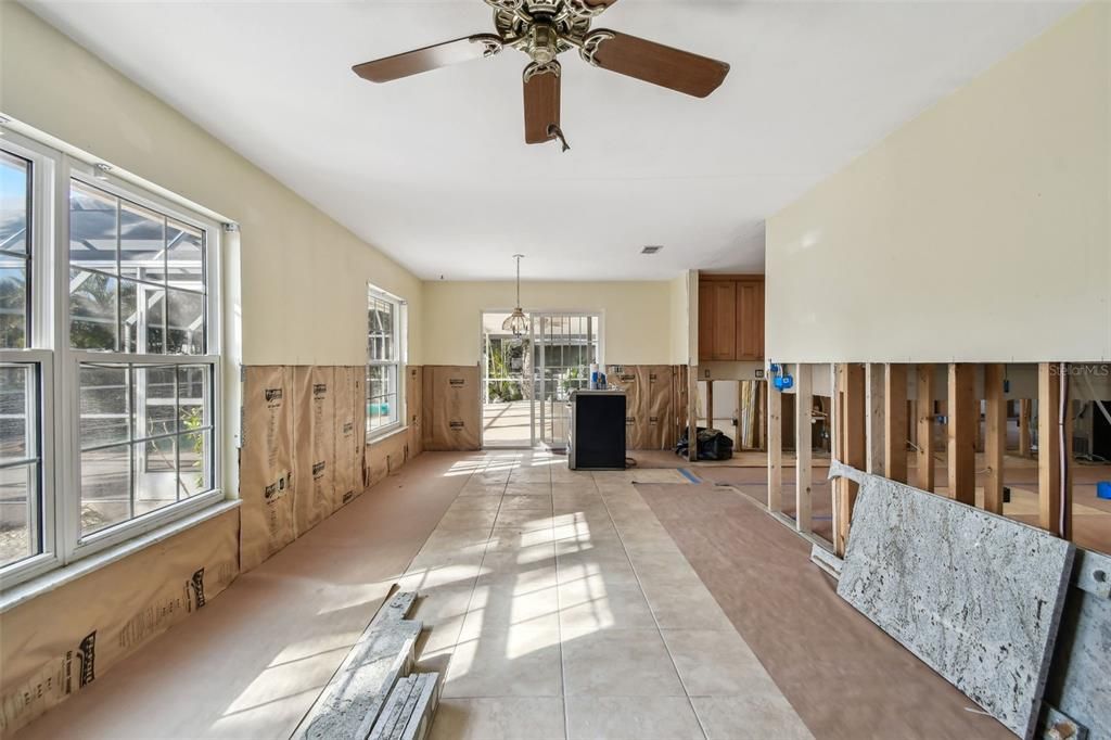 Family room looking back toward sliders leading to the pool.  Kitchen is to the right.